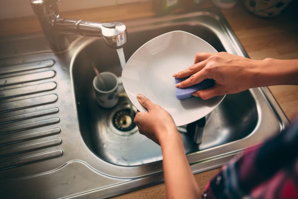 Cleaning Dishes in kitchen
